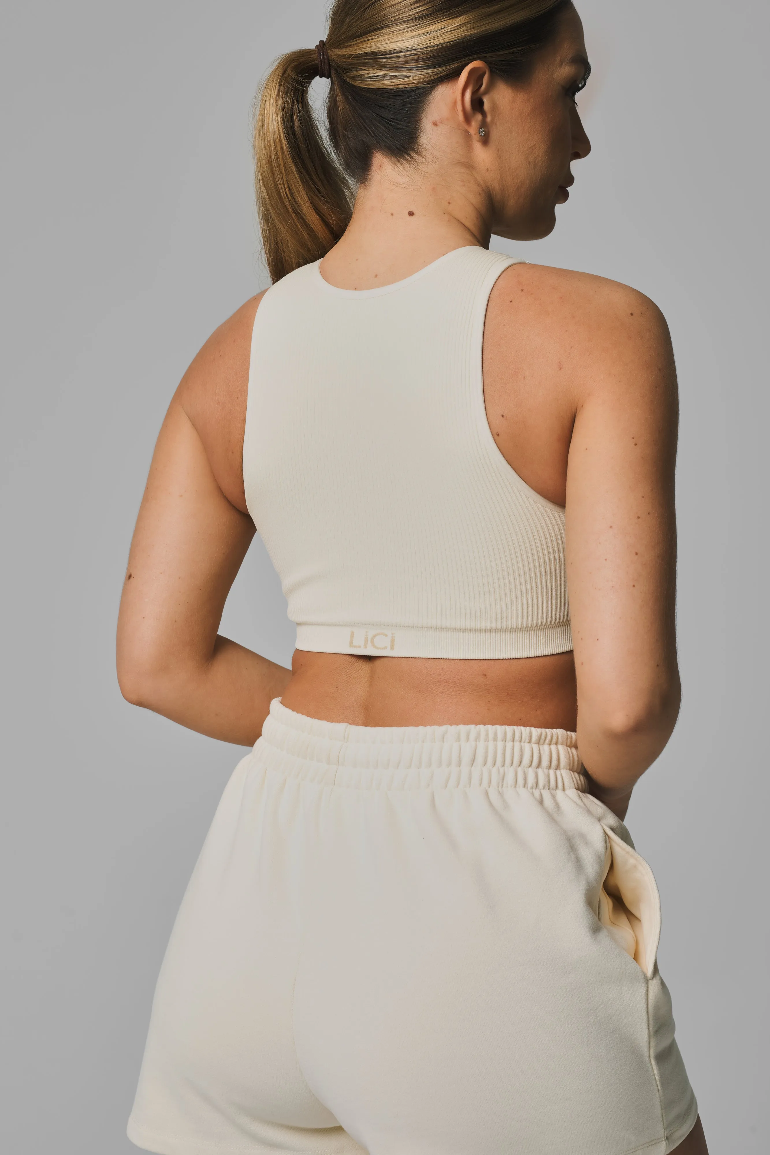 Cream Seamless Ribbed High Neck Crop Top